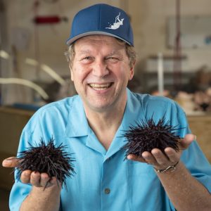 Dave Rudie holding sea urchins